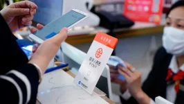 الصين تجهز نظام مدفوعات رقمي لمنافسة الدولار